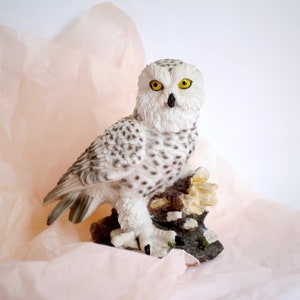 Owl figurine on a log, detailed hawk owl sculpture not only for wizard apprentice