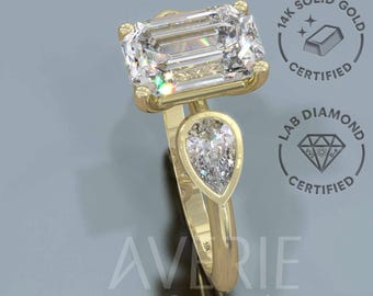 14k Three Stone Emerald Diamond Engagement Ring. 14k gold engagement Three Stones ring set with Emerald and Pear lab grown diamonds