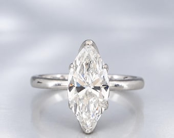Anel de Noivado com Diamante em Lapidação Marquise | Anel de noivado solitário em ouro branco 14k com diamante cultivado em laboratório em lapidação marquise. Anel de compromisso com diamante em lapidação marquise