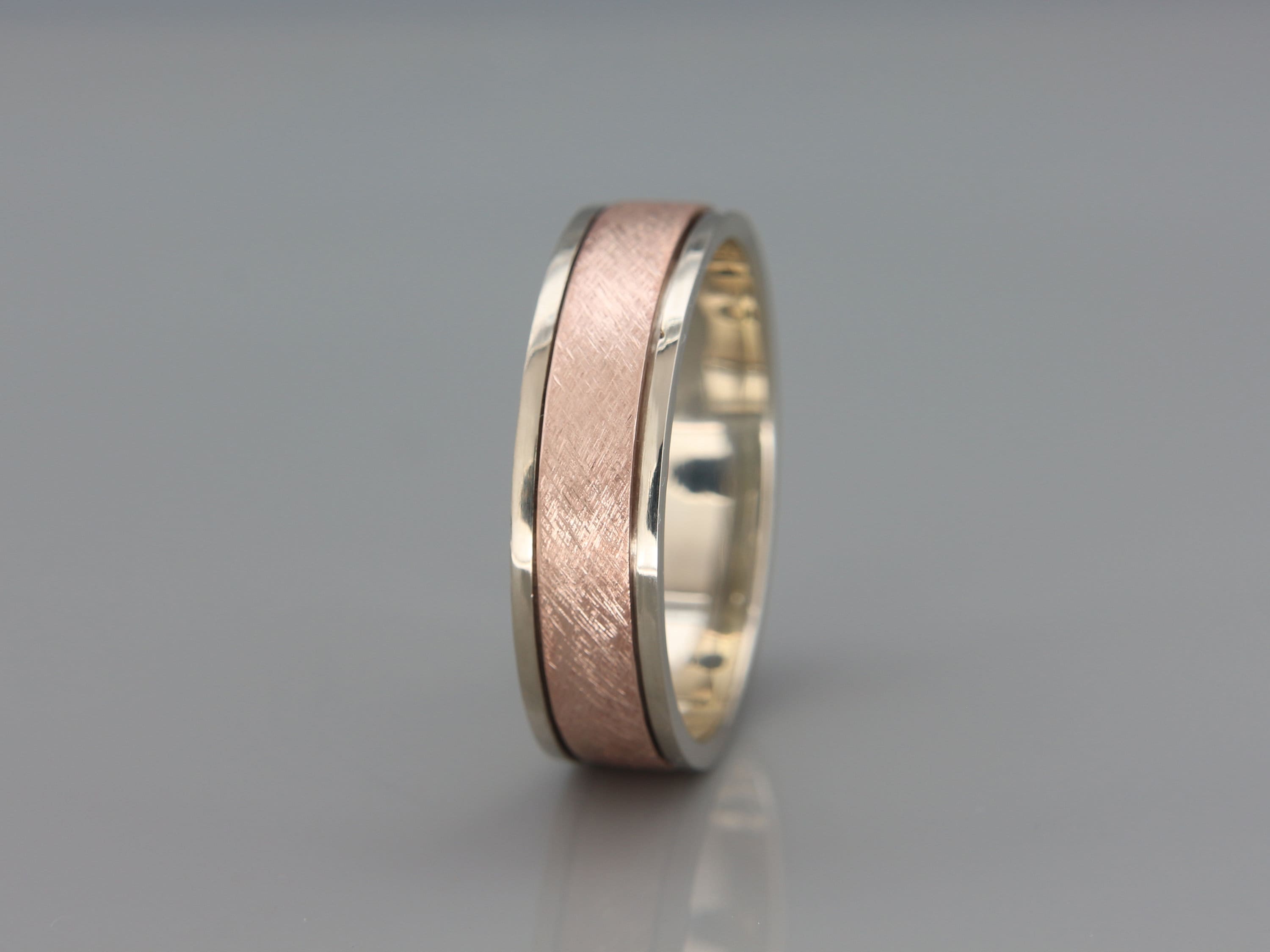 White And Rose Gold Spinner Band