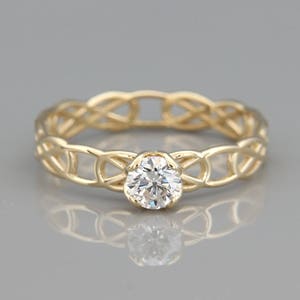 14K Gold Celtic Engagement Ring set with a Diamond | Handmade solid 14k rose gold Celtic engagement ring set with a Brilliant Diamond