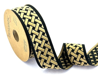 May include: A roll of black and gold ribbon with a woven pattern. The ribbon is on a brown cardboard spool with the word "Fantastic" printed on it.