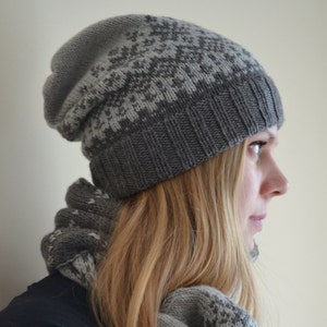 Slouchy beanie hat in Nordic style. Unisex Norwegian snowflakes hand knitted in fair isle technique. Adult size, merino wool