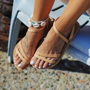 Woman wearing KALLISTO natural sandals — summer outfit