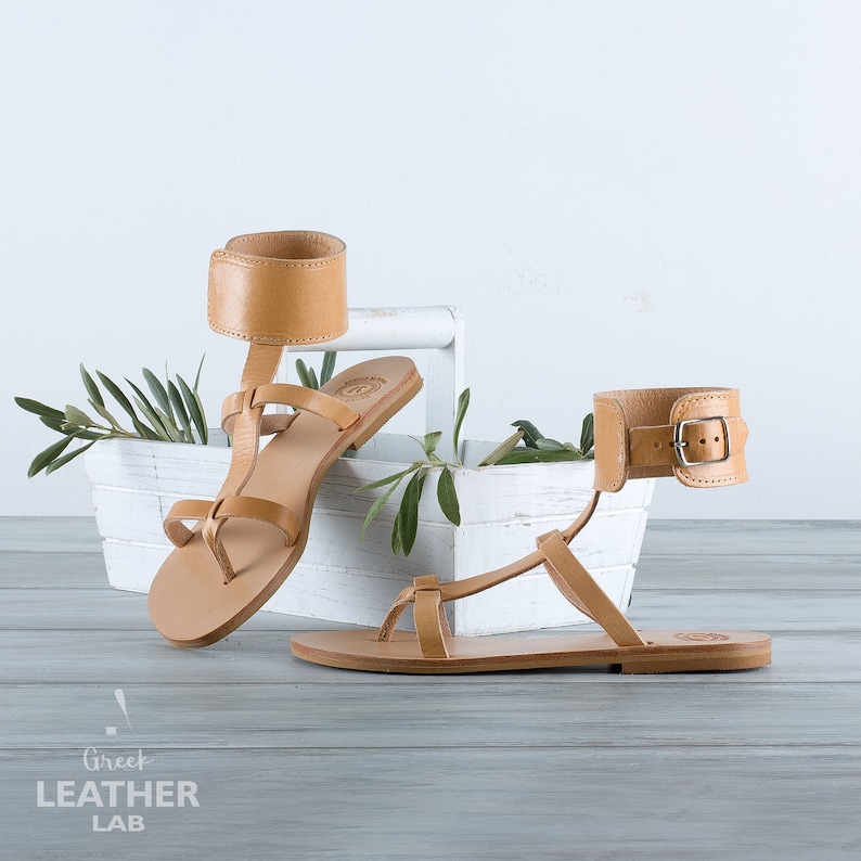 Side profile of the natural leather ankle cuff sandal style, showing the low 1.2cm heel height.