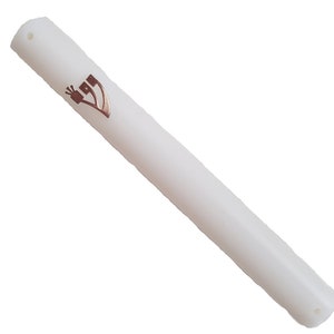 May include: White plastic mezuzah case with a gold Hebrew letter Shin on the front.