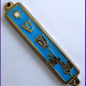 May include: A gold-colored mezuzah with a blue enamel background. The mezuzah features a Star of David, the Hebrew letter Shin, a rose, and a branch of leaves.