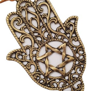 Artistic brass or gold hamsa wallhanging Star of / Magen David 3D design kabbalah from Israel