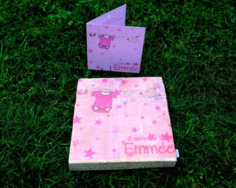 Birth announcement card on wood