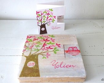 Birth announcement card on wood