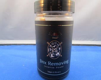 May include: A black jar with a white label that says "Jinx Removing Incense Power" and a black and white illustration of a cross with various symbols. The jar is 50gm (1.76 oz).