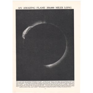 May include: A vintage black and white photograph depicting a solar eclipse. The sun is a dark circle, surrounded by a bright corona. The text at the top reads "AN AMAZING FLAME 563,270 KILOMETERS LONG". Published by the Royal Astronomical Society.