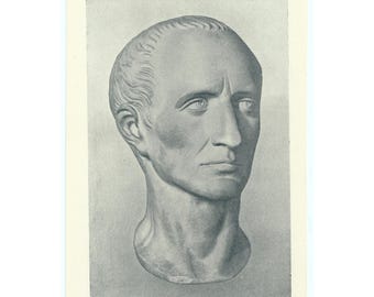 May include: A black and white photograph of a bust of Julius Caesar. The bust is made of marble and shows Caesar's face in profile. The caption below the bust reads "The foremost man of all this world - From a sculpture in the British Museum, probably carved by a man who saw Caesar."
