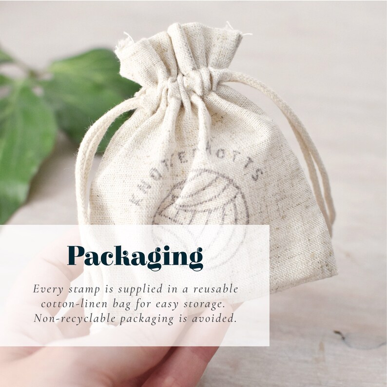 May include: A beige cotton-linen drawstring bag with the text "KNOT&NOTTS" and a graphic. The bag is labeled "Packaging" and states that stamps are supplied in a reusable bag for easy storage. Non-recyclable packaging is avoided.