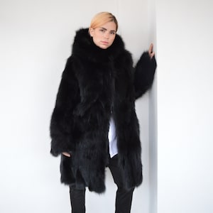 Real black fox fur hooded coat. Winter fur stroller in genuine supple fox fur pelt, super warm and fluffy luxury fur gift for women.