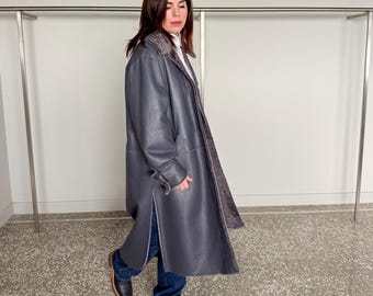 Reversible grayish merino shearling and leather coat: Super warm and silky soft Argento Sheepskin stroller.