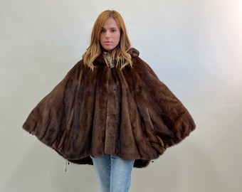 Real Demi buff mink fur hooded cape with zip closure and drawstrings on hem.Fabulous poncho mink supple full skin fur.Affordable fur gift.