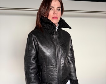 Full grain Reversible Black Swakara lamb fur with nappa dressed leather and zipper .Thick shearling Fur Jacket.