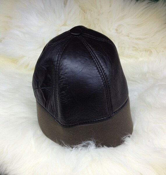 khaki leather cap