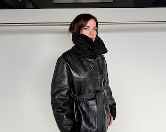 Full grain Reversible Black Swakara lamb fur with nappa dressed leather and tie belt .Thick shearling Fur Jacket.