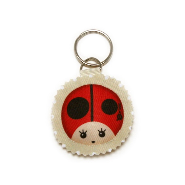 Porte-clés coccinelle rouge, petit coussin rond et rembourré