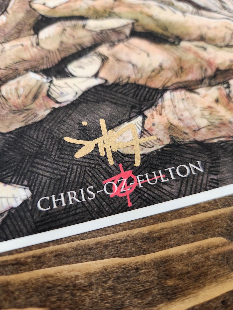May include: A black and white drawing of hands with a gold signature that reads "CHRIS-OZ FULTON" in a stylised font.