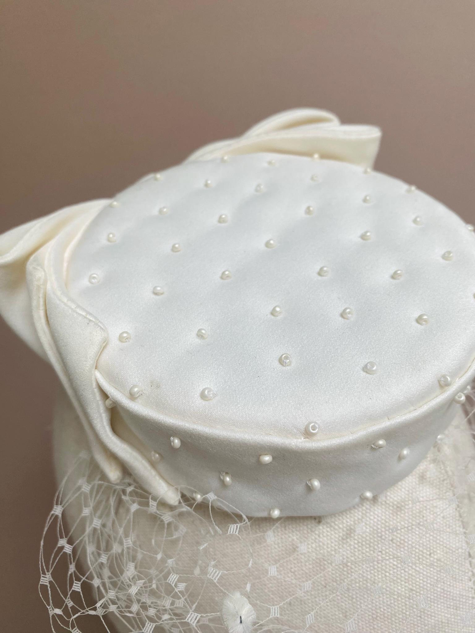 White satin pillbox hat with decorative bow detail Bridal Pillbox Hat with Veil and Bow - ALENA main image 4
