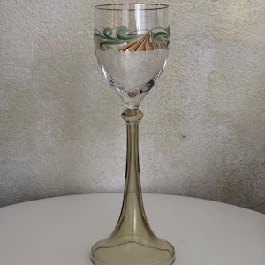 May include: A handcrafted wooden sign, painted white with black lettering, reading "Welcome to our home". The sign has a distressed finish, ideal for adding a rustic touch to any home.