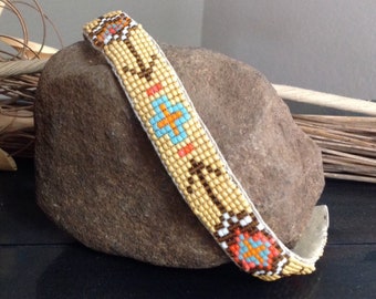 Hand loomed seed beaded bracelet or anklet, "Southwest Arrows" with pig skin leather backing and tie