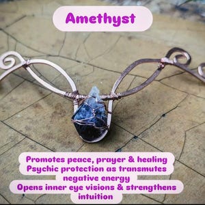 May include: A copper wire-wrapped headpiece featuring a central dark purple amethyst crystal. The metal wire is shaped into symmetrical, swirling, and oval patterns on both sides. Text on the image reads: Amethyst, Promotes peace, prayer & healing, Psychic protection as transmutes negative energy, Opens inner eye visions & strengthens intuition.