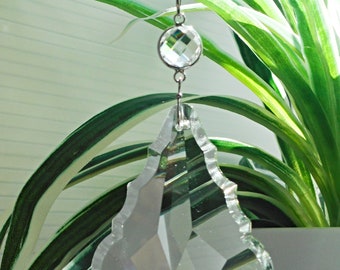 Crystal suncatcher with tulip accents. Minimalist design with a large baroque style prism. Elegant gift for any occasion. Free gift wrapping
