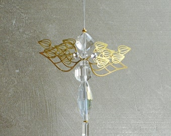 Fantasy insects for a magical gift and something different. Hanging crystal as a window accent that is individually made. Sparkling crystal.