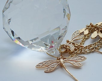 Big crystal ball, handmade suncatcher with golden dragonflies. Gift for yourself or gift to give. Minimalist design, elegant style.