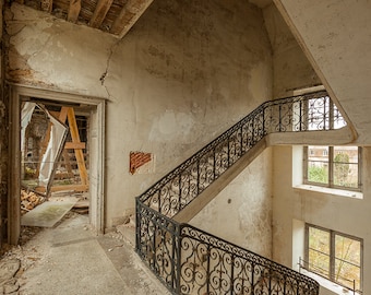 Photography of stairs in an abandoned chateau near Paris, France