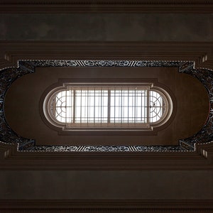 Photography of a skylight in an abandoned chateau in France