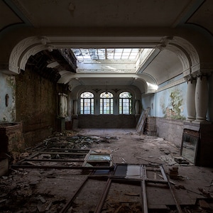 Abandoned reception hall of a grand hotel in France