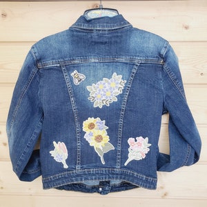 Up-Cycled  Flowers & Butterflies Patched Distress Denim Jacket Size M Patched Jean Jacket.