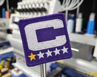 Captain C Purple Football  Embroidered Patch Iron On or Sew On