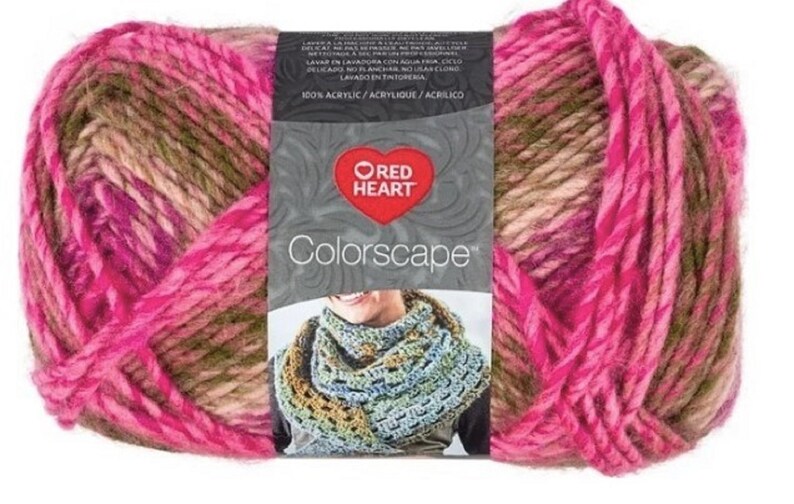 May include: A skein of Red Heart Colorscape yarn in a pink, brown, and green colorway. The yarn is 100% acrylic and is machine washable.