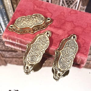 May include: A handmade wooden sign with the text "Welcome" in a playful font. The sign features a distressed finish, giving it a rustic appearance. It's likely designed for home decor, suitable for hanging on a door or wall.