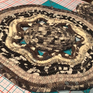 Free Form 7 point star Shaped Coiled Clothesline Trivet in Black Silver and Grey Cotton Batiks Trivet #59 - 12.5” x 10.5”