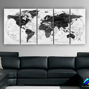 May include: A black and white world map print in a vintage style. The map is divided into four panels, each showing a different part of the world. The map is printed on a white background with a distressed look.