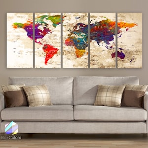 May include: A five-piece canvas wall art set featuring a colorful world map with a vintage, distressed look. The map is printed on a beige background with a subtle texture.