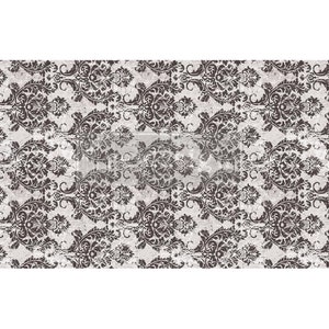 May include: A distressed, vintage-style pattern featuring a repeating damask design in dark brown against a light grey background. The ornate, swirling floral motifs create a classic, textured look, suitable for home decor or craft projects.