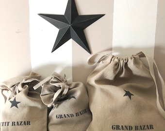 Linen bag with "Petit Bazar" or "Grand Bazar" printing.