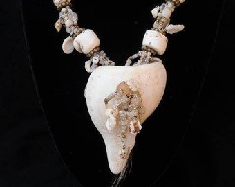 Necklace ~ Goddess of the Ocean Mystical, Entice yourself with this Cornucopia of Shells  sounds of alluring waves. Artist: Teresa Bradford