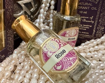Rose Oil, A sweet, rich smell reminiscent of a rose garden in full bloom, often described a romantic and timeless, Perfume Oil from India