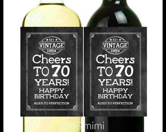 May include: Two wine bottle labels with a chalkboard design. The labels feature the text "EST. VINTAGE 1954" and "Cheers to 70 Years! Happy Birthday Aged to Perfection".