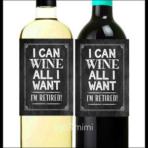 May include: Two wine bottles with black chalkboard labels that say "I can wine all I want I'm retired!" in white text.