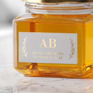 Etichette per bomboniere di piccole dimensioni: iniziali botaniche, adesivi rettangolari in lamina e trasparenti